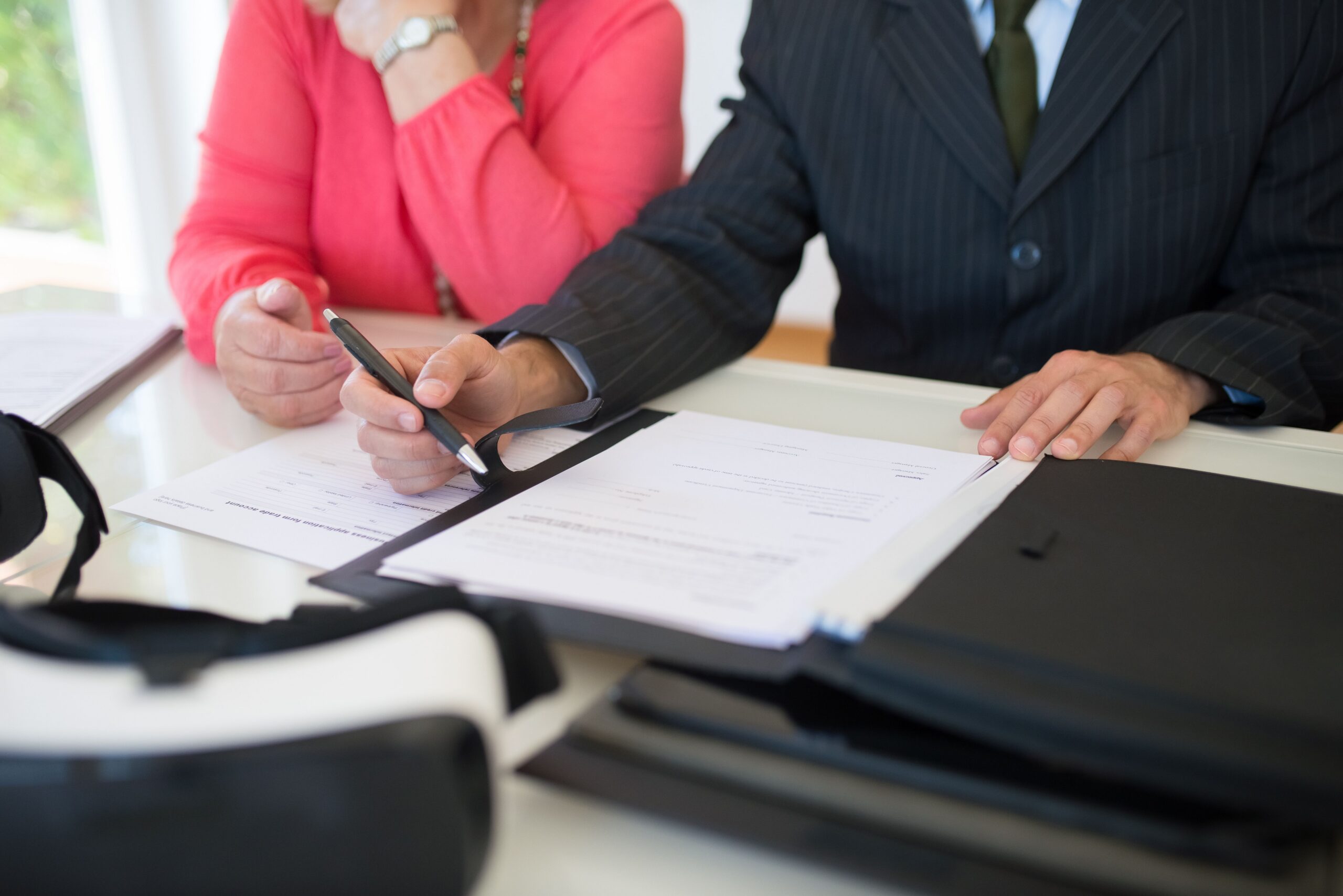 California probate inventory and appraisal documents on a desk with a calculator and pen